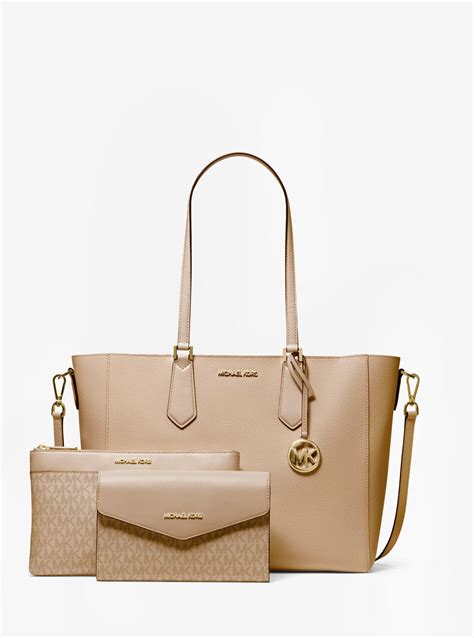 michael kors tote bag 3 for 1|Michael Kors three pocket handbags.